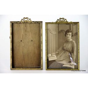 A pair of vintage gilt metal photo frames, early 20th century,…