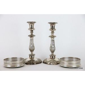 A pair of Sheffield Plate candlesticks and a pair of plated…
