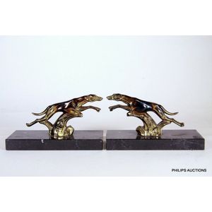 A pair of Art Deco spelter leaping dog bookends, circa 1920s,…