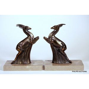 A pair of Art Deco spelter leaping antelope bookends, circa…