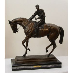 A superb bronze sculpture of a horse and rider on rectangular…