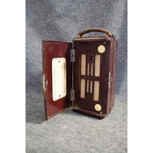 A Hotpoint Bandmaster personal portable radio AF some case…