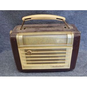 An AWA Radiola 6, portable valve radio in cream and brown…