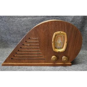 A Crosley Waveform timber cased valve radio 110v serial number…