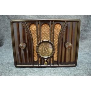 An Emerson brown Bakelite valve radio serial number n/a, 18 x…