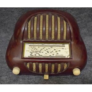 A Sonorett brown Bakelite valve radio circa 1950, missing…
