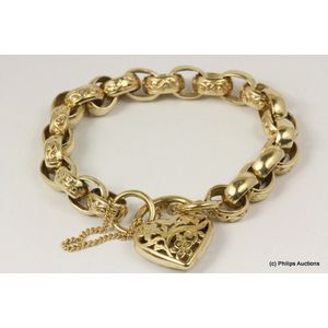 A solid gold night and day padlock bracelet, 9ct yellow gold,…