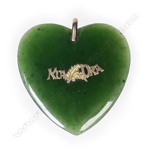 A colonial 9ct gold and pounamu heart pendant, gold Kia Ora and…