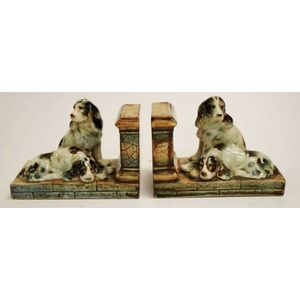 Pair of ceramic figural bookends each with two hound dogs, 15…