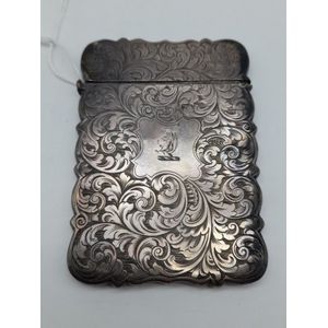Victorian silver card case, decorated with engraved scrolls and…