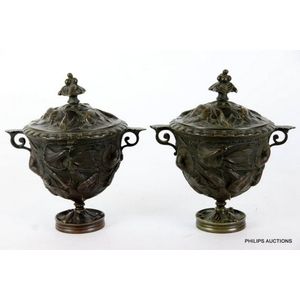 A pair of small bronze urns, probably French, early 20th…