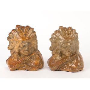 A pair of brickworks workman's pottery bookends in the form of…