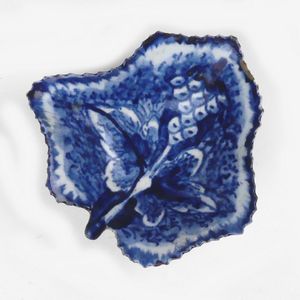 An 18th century Bow blue and white leaf-shaped pickle dish,…