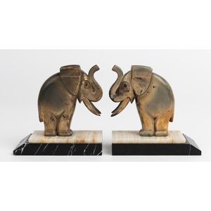 A pair of onyx and marble spelter elephant book-ends, 14 cm high