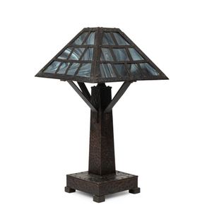 An Arts & Crafts style lead light table lamp, in the style of…