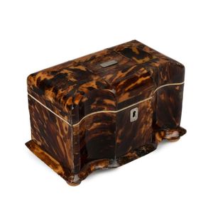 A George III tortoisehell and ivory veneered tea caddy, with a…