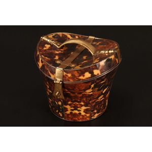 Faux tortoiseshell tea caddy, in the form of a hat box with…