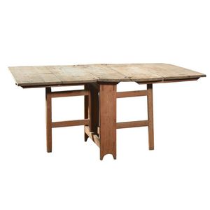 A rustic pine folding dining table, Baltic, 18th century, the…