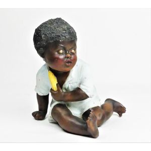 A rare Gebrude Heubach bisque figure of a Negro, Termed in the…