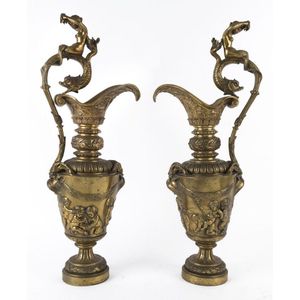 A pair of French gilt metal ewers, 19th century, 69 cm high