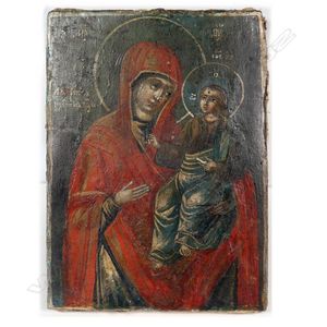 A small Hodegetria icon, enamel on panel, fabric covered back.…