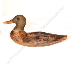 A c1920 fine weave oil skin duck decoy, kapok filled, glass&hellip;
