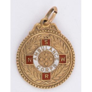 New South Wales Ambulance Corps: 9ct gold fob (4.8gms) engraved…