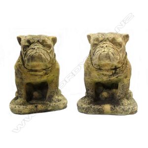 A pair of English Church stone bulldog sculptures, modelled…