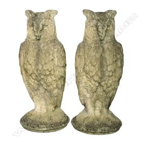 A pair of classical Church Stone owl garden ornaments, standing…