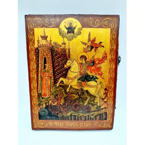 Orthodox religious icon, depicting St George and the dragon,…