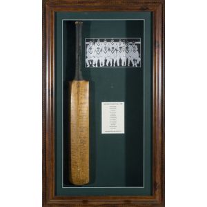 A framed display of a bat, signed by the 1930 Australian Ashes…