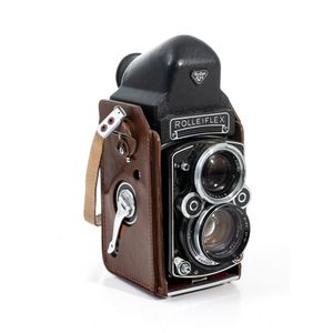 A Franke and Heidecke Rolleiflex with prismatic Viewfinder and…