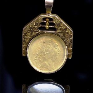 Antique 15ct yellow gold fob spinner set with a encased George&hellip;