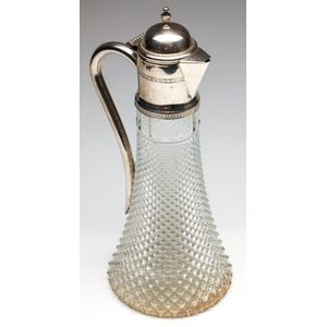 A silverplated and cut glass claret jug, height 35 cm