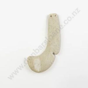 A carved whalebone matau shaped pendant. Two countersunk&hellip;