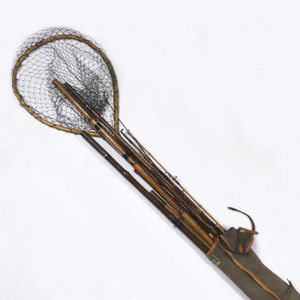 A collection of vintage fishing equipment, includes bamboo rods…