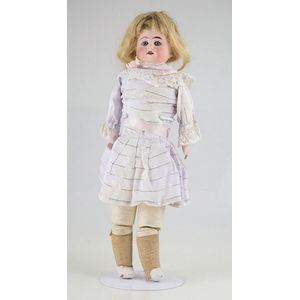 Cuno & Otto Dressel bisque shoulder plate doll, blue stationary…