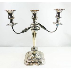 Grand Victorian inspired candle stick stand having a sculpted…