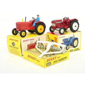 Three boxed Dinky models, including no. 308 Leyland 384 Tractor,…