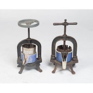 Two cast iron and two blue ceramic Presse a Canard, French,…