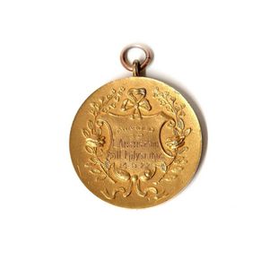 A historic 1927 large and heavy 9ct. gilded rose gold medallion…