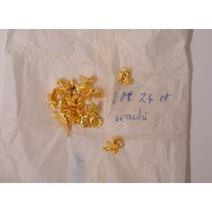 1oz. fine gold nuggets, the tissue outer marked '1oz 24ct.…
