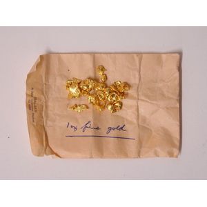 1oz. fine gold nuggets, in small envelope, detail to the…