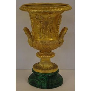 19th century French decorative gilt bronze urn on faux…
