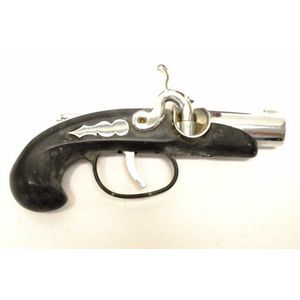 Vintage novelty lighter in the form of a gun fitted on a timber…