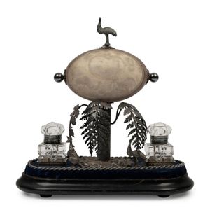 An antique Australian silver plated emu egg ink well, 19th…