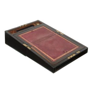 An English traveling writing box, coromandel with brass inlay…