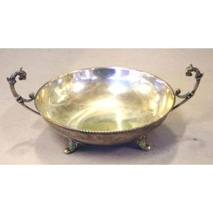 Sterling silver twin handle bowl on four feet, stamped 900,…