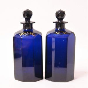 A pair of George III octagonal Bristol blue glass decanters,…