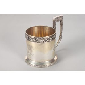 Russian silver tea cup holder, of cylindrical form, with angled…